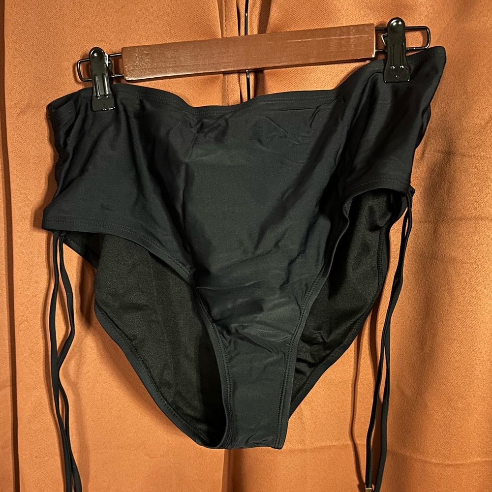 Black High waisted bathing suit bottom with string ties on sides. Size XL